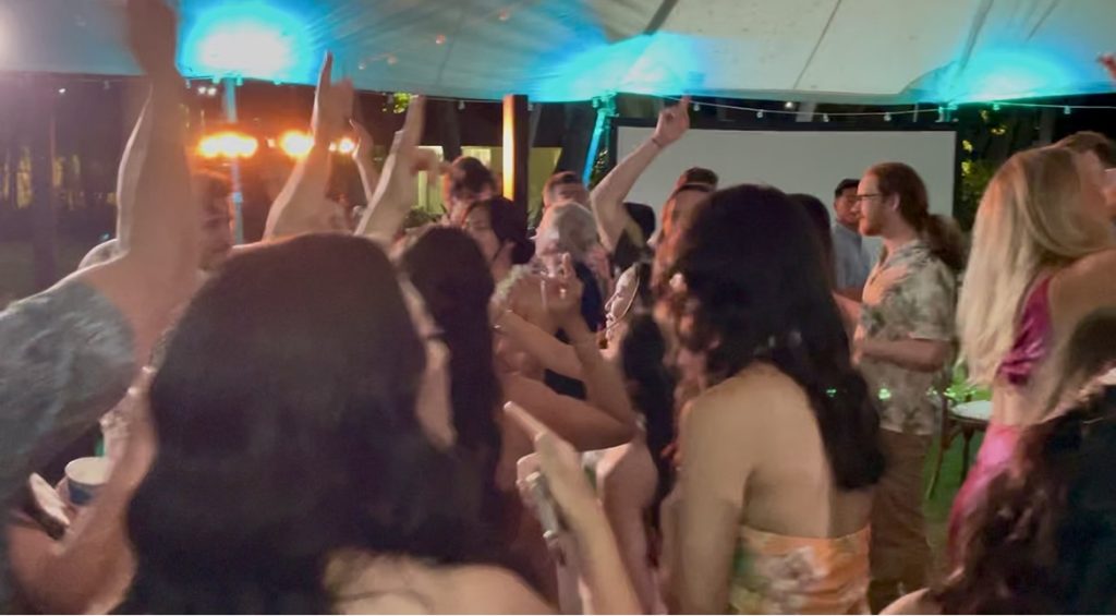 Bridesmaids dancing at Lanikuhonua