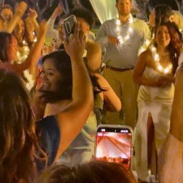 Lanikuhonua outdoor wedding DJ. People dancing.